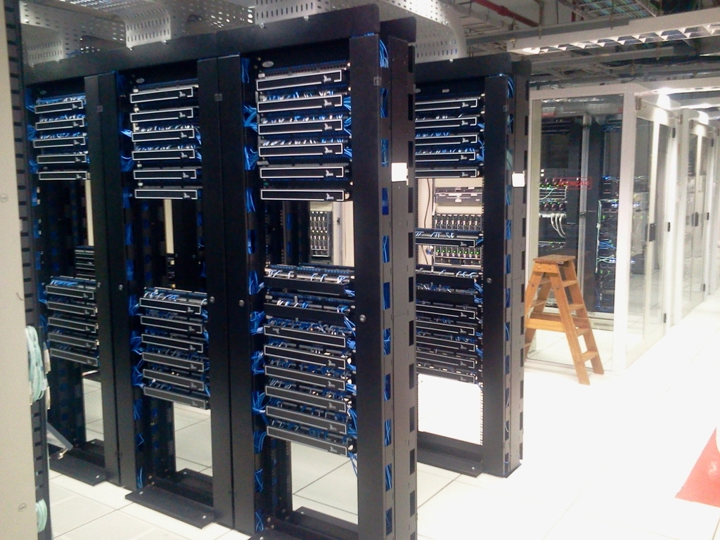 Rows of server racks in a data center