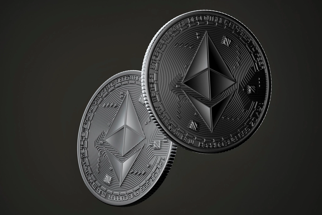 Physical ethereum coin on a dark surface